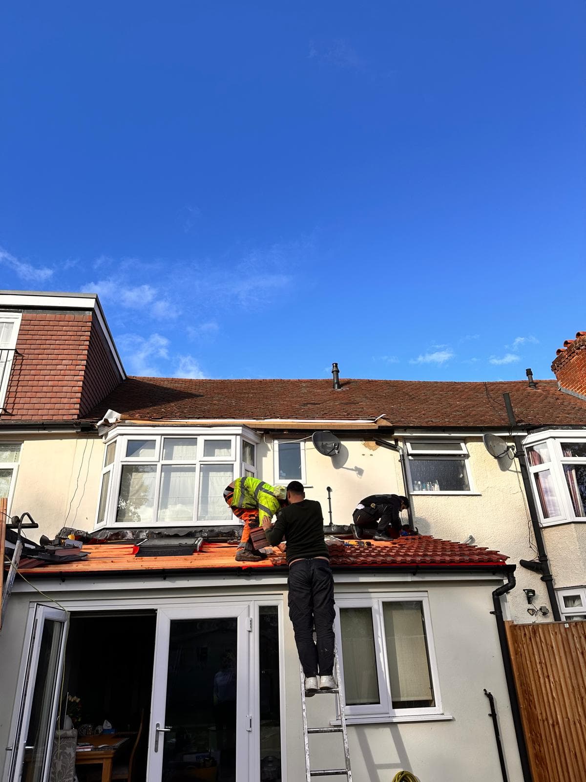 Roof repair on terraced house extension